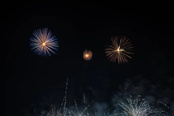 Stock image Colorful firework with bokeh background. New Year celebration, Abstract holiday background