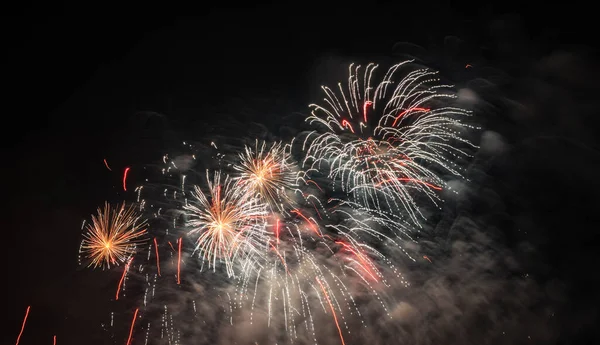 stock image Colorful firework with bokeh background. New Year celebration, Abstract holiday background