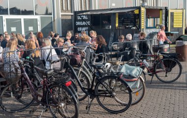 COPENHAGEN, DENMARK - AUGUST 23, 2017: Copenhagen Street Food Papiroen Area with People clipart