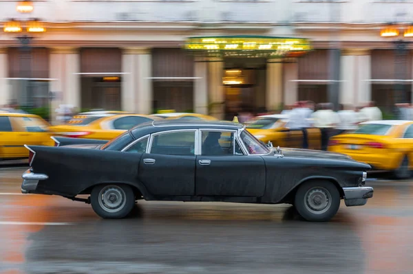 stock image HAVANA, CUBA - OCTOBER 21, 2017: Old Style Retro Car in Havana, Cuba. Public Transport Taxi Car for Tourist and Local People. Black Color