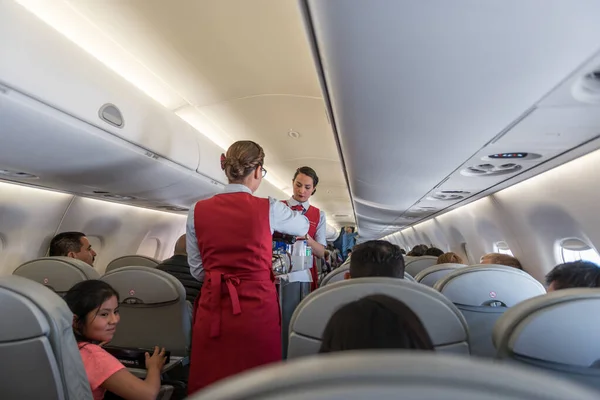 stock image GUATEMALA -NOVEMBER 22, 2017: AeroMexico Airplane, Cabin Crew Working and Provinding Food.