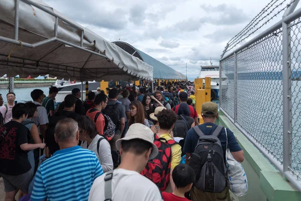 stock image BOHOL, PHILIPPINES - FEBRUARY 14, 2018: Gate to the port of Tagbilaran in Philippines, Bohol Island. People are Boarding to the ferries. Crowded port.