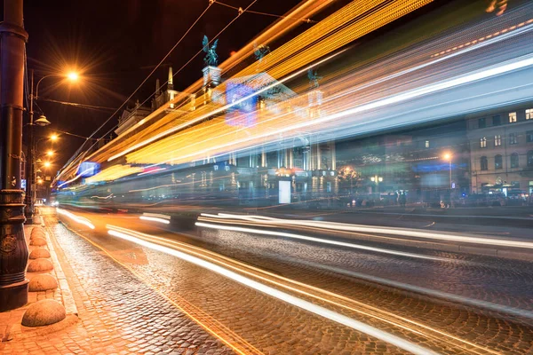 stock image Traffic Light and Lviv National Academic theatre of opera and ballet named after Solomiya Krushelnytska with People in Background. Long Exposure. Night time