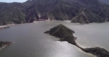 Pyramid Lake in California. It is a reservoir formed by Pyramid Dam on Piru Creek in the eastern San Emigdio Mountains, near Castaic, Southern California, in Los Padres National Forest.