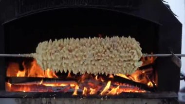 Sakotis is a Polish Lithuanian traditional spit cake. It is a cake made of butter, egg whites and yolks, flour, sugar, and cream, cooked on a rotating spit in an oven or over an open fire