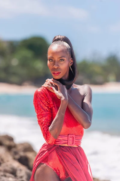 stock image Portrait of Beautiful Caribbean Adult Teen in Barbados. Wearing Red Bikini on a tropical beach. Caribbean Sea in Background. Black. Portrait.