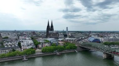 Cologne City Cathedral, Central Train Station, Hbf, Rhine River. Hohenzollern Bridge. Germany, Drone, 4k