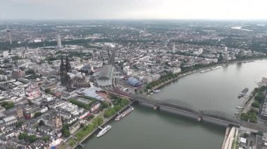 Panorama View of Cologne City in Germany. Drone, 4k. Rhine River, Cathedral, Central Train Station, Hbf, Rhine River. Hohenzollern Bridge