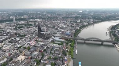 Panorama View of Cologne City in Germany. Drone, 4k. Rhine River, Cathedral, Central Train Station, Hbf, Rhine River. Hohenzollern Bridge