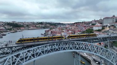 Douro Bridge in Porto City and Metro Train is Going. Portugal. Drone, 4k