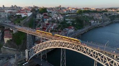 Metro Train on the Ponte Luis I Bridge in Porto City, Lisbon. Drone, 4k.