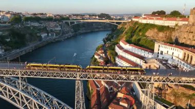 Metro Train on the Ponte Luis I Bridge in Porto City, Lisbon. Monastery. Drone, 4k.