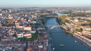 Porto City with Dom Luis Bridge, Douro river, Portugal. Drone, 4k. Sunset