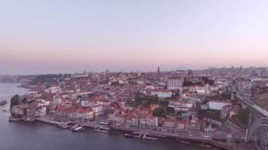 Ribeira District in Porto City, Portugal. Douro River, Downtown In Background. Drone, 4k