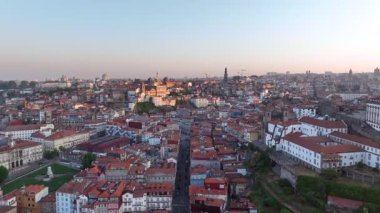 Ribeira District in Porto City, Portugal. Sunrise, Golden Hour. Beatiful Downtown Architecture. Drone, 4k