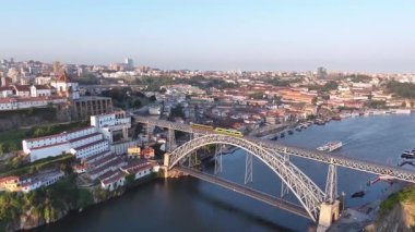 View of Porto city and Douro river and Dom Luis bridge I. Drone, 4k. Sunrise