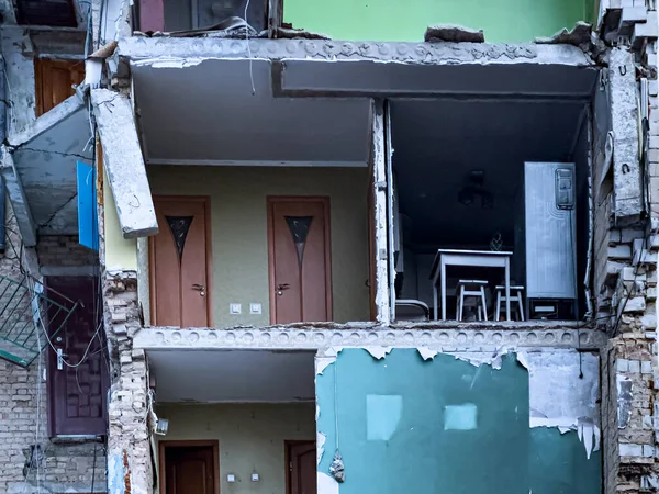 Borodyanka Kyiv Region 02.05.2023 A surviving room of an apartment in a bombed-out building. High quality photo
