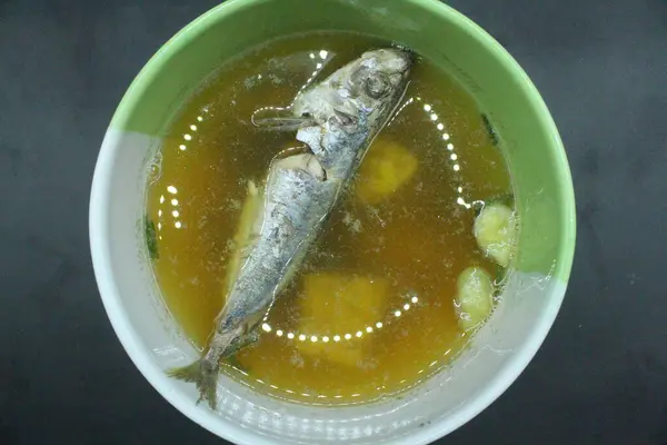 mackerel fish in a bowl on the table.