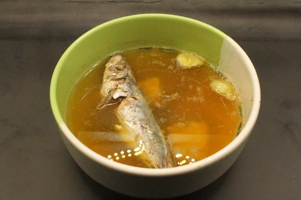 mackerel fish in a bowl on the table.