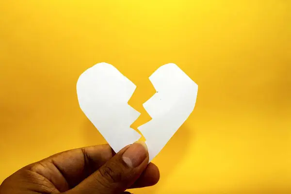photo illustration of broken heart, breakup