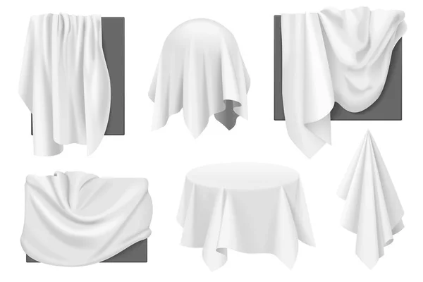 stock vector White cloth covers on objects with drapery set vector illustration. 3D realistic isolated secret presentation under fabric before revealing, silk tablecloth on table with wavy drape, hidden frames