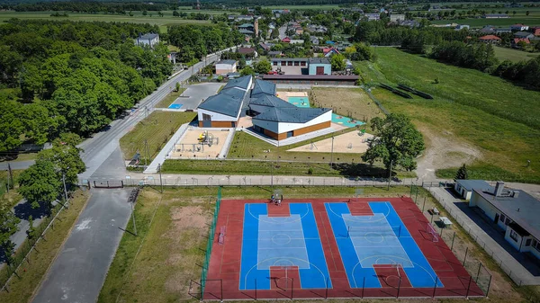 stock image Sports fields and kindergarten in the village of Sedziejowice, Poland.