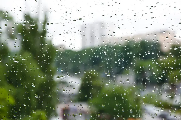 rain drop background. raindrop in autumn weather. rainy water surface on glass. wet rain drop background. droplet on window or condensation. autumn raindrop.