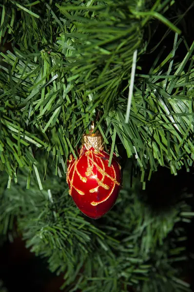 Festive Christmas scene. Christmas tree decoration. Decoration for New Year holiday celebration. Happy New Year. Christmas Tree Background. Beautiful Christmas gift near fir tree in room.