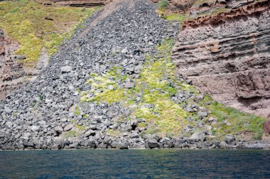 Nature formation. Geological rock formation. Tourism and travel destination, Greece. Geology rockfall. Volcanic rock nature. Rock formation with erosion. Landscape with rock formation. clipart