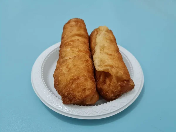 stock image Snacks from the market are fried bread that is oval in shape with a sweet taste