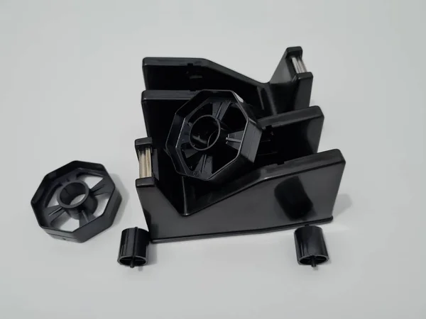 Wheel Cutting Black Plastic Insulation — Stock Photo, Image