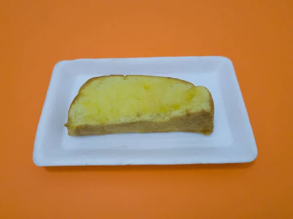 Żółty Brązowy Chleb Grzebieniowy Słodkim Masłem Jest Odpowiedni Jedzenia Każdej — Zdjęcie stockowe