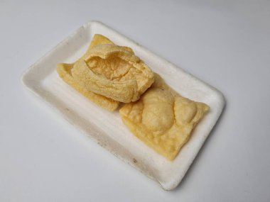 Brown crackers with a savory taste made from flour and other ingredients