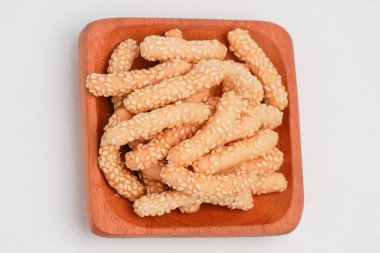 Un ve susamdan yapılan oval şekilli kuru atıştırmalıklara keciput denir.