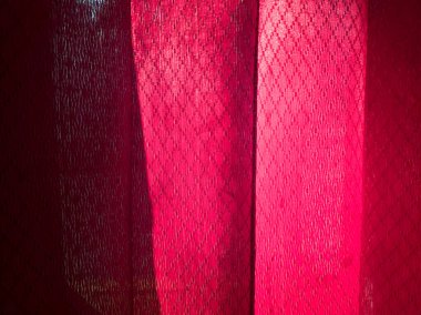 Kırmızı çizgili pencere perdesi kumaşının soyut arka planı