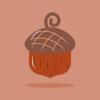 Kahverengi arka planda izole edilmiş bir palamut.