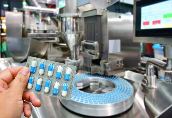 Hand Holding Blue Capsule Pack Medicine Pill Production Line Industrial — Stock Photo, Image