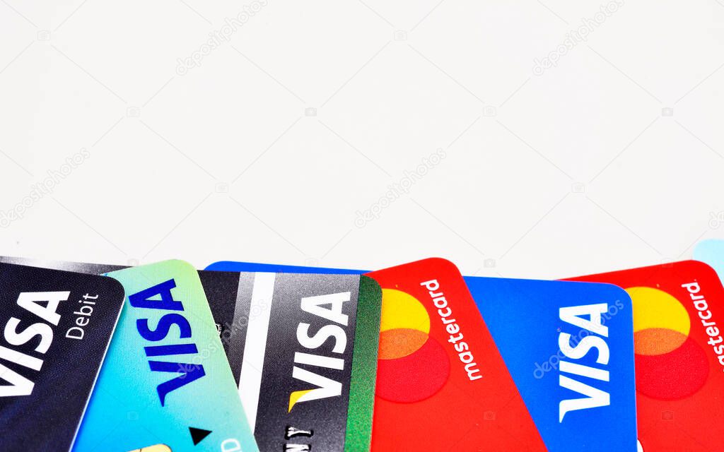 Bangkok, Thailand - August 3, 2017: Close up of many VISA and MASTER credit card background with new logo.plastic bank payment cards