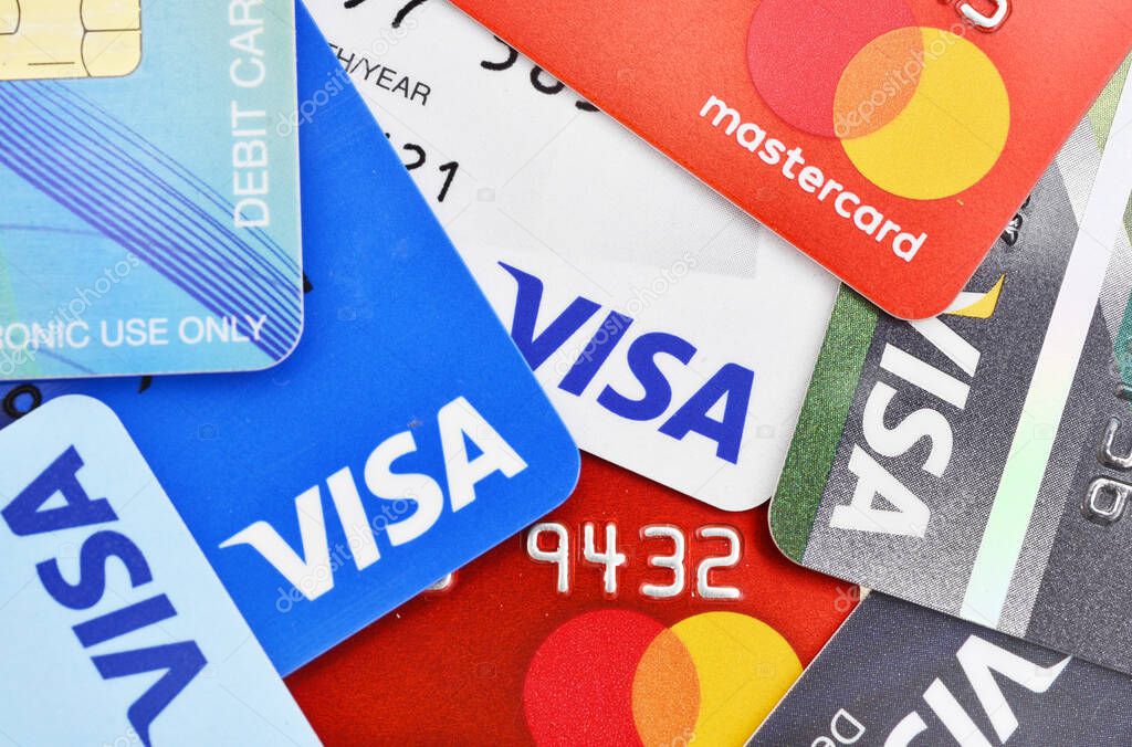 Bangkok, Thailand - August 3, 2017: Close up of many VISA and MASTER credit card background with new logo.plastic bank payment cards