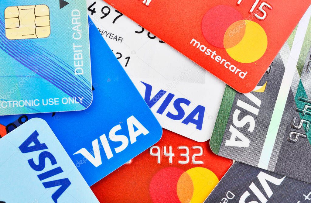 Bangkok, Thailand - August 3, 2017: Close up of many VISA and MASTER credit card background with new logo.plastic bank payment cards