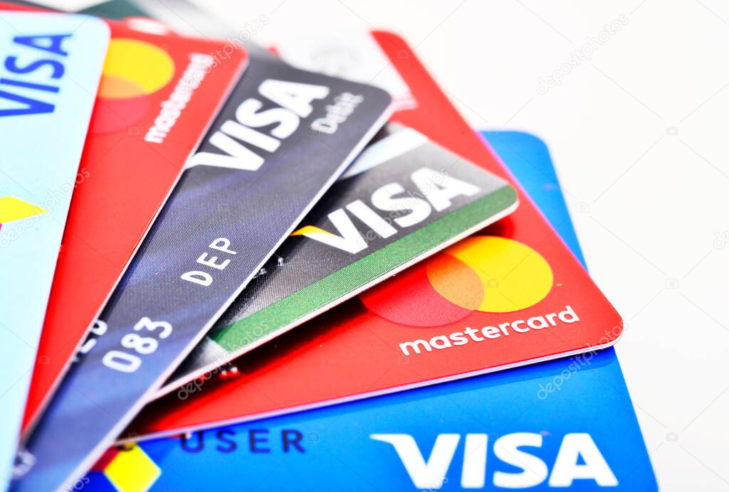 Bangkok, Thailand - August 3, 2017: Close up of many VISA and MASTER credit card background with new logo.plastic bank payment cards