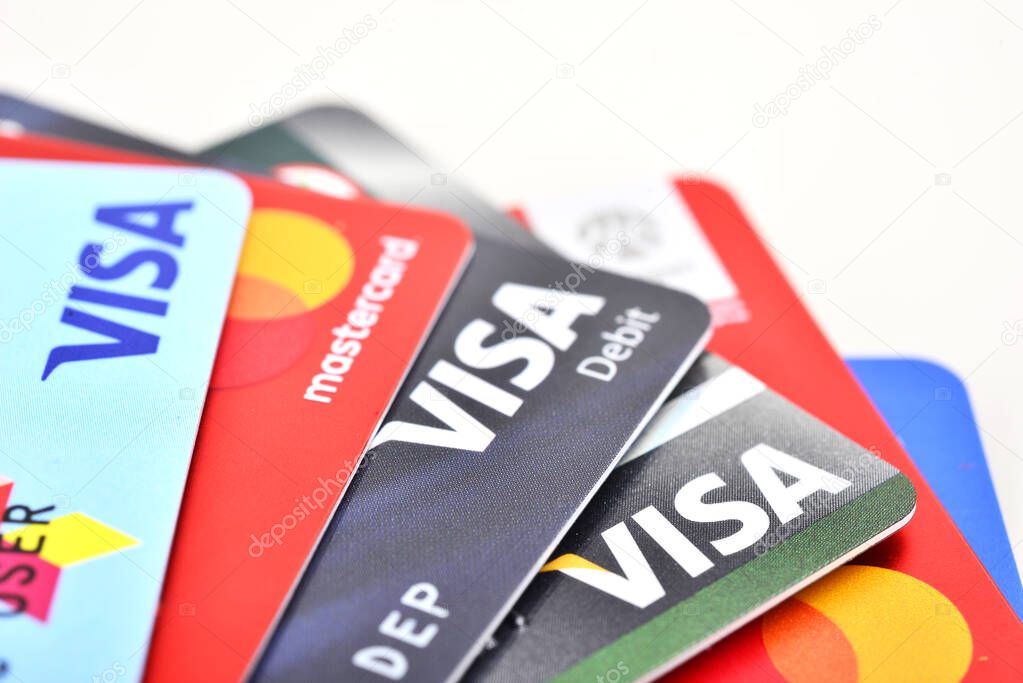 Bangkok, Thailand - August 3, 2017: Close up of many VISA and MASTER credit card background with new logo.plastic bank payment cards
