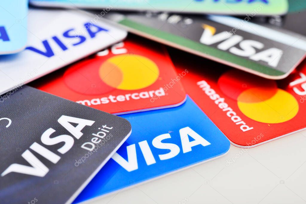 Bangkok, Thailand - August 3, 2017: Close up of many VISA and MASTER credit card background with new logo.plastic bank payment cards