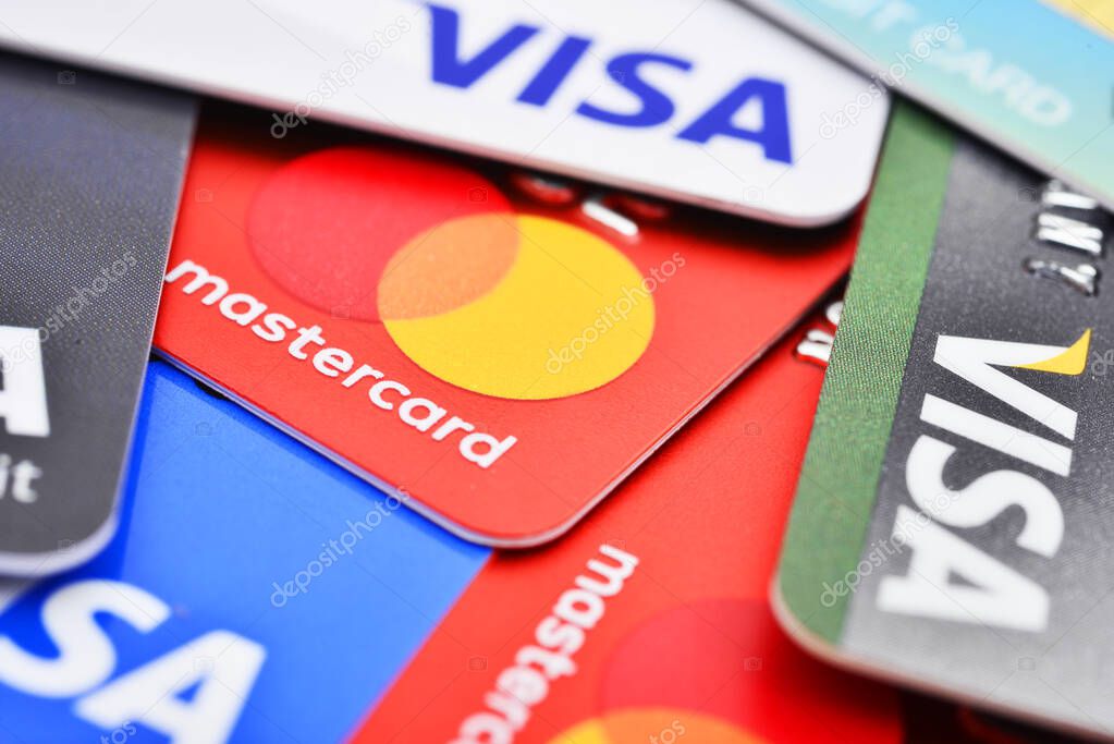 Bangkok, Thailand - August 3, 2017: Close up of many VISA and MASTER credit card background with new logo.plastic bank payment cards