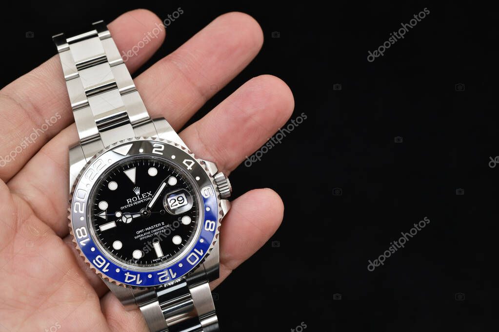 Bangkok Thailand- Feb 20,2022 :Hand holding Rolex GMT-Master II 