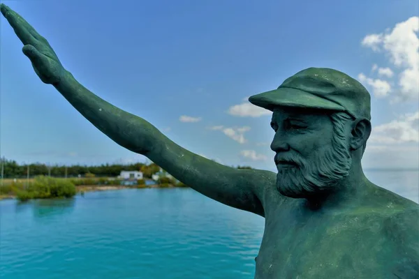 Monument of waving man on the bridge between Cayo Coco and Cayo Guillermo