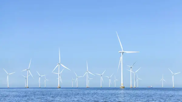Offshore Wind Turbines Farm in the sea . Lillgrund Wind farm by the coast of Denmark and Sweden.