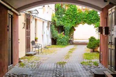 Charming courtyard in Uzupis, Vilnius old town. Baltic, trend destination , sightseeing. Lithuania. Copy space clipart