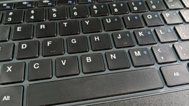 closeup shot of black laptop keyboard. for the background technology concept