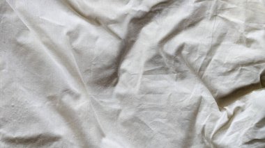 Crumpled brown cloth texture for background